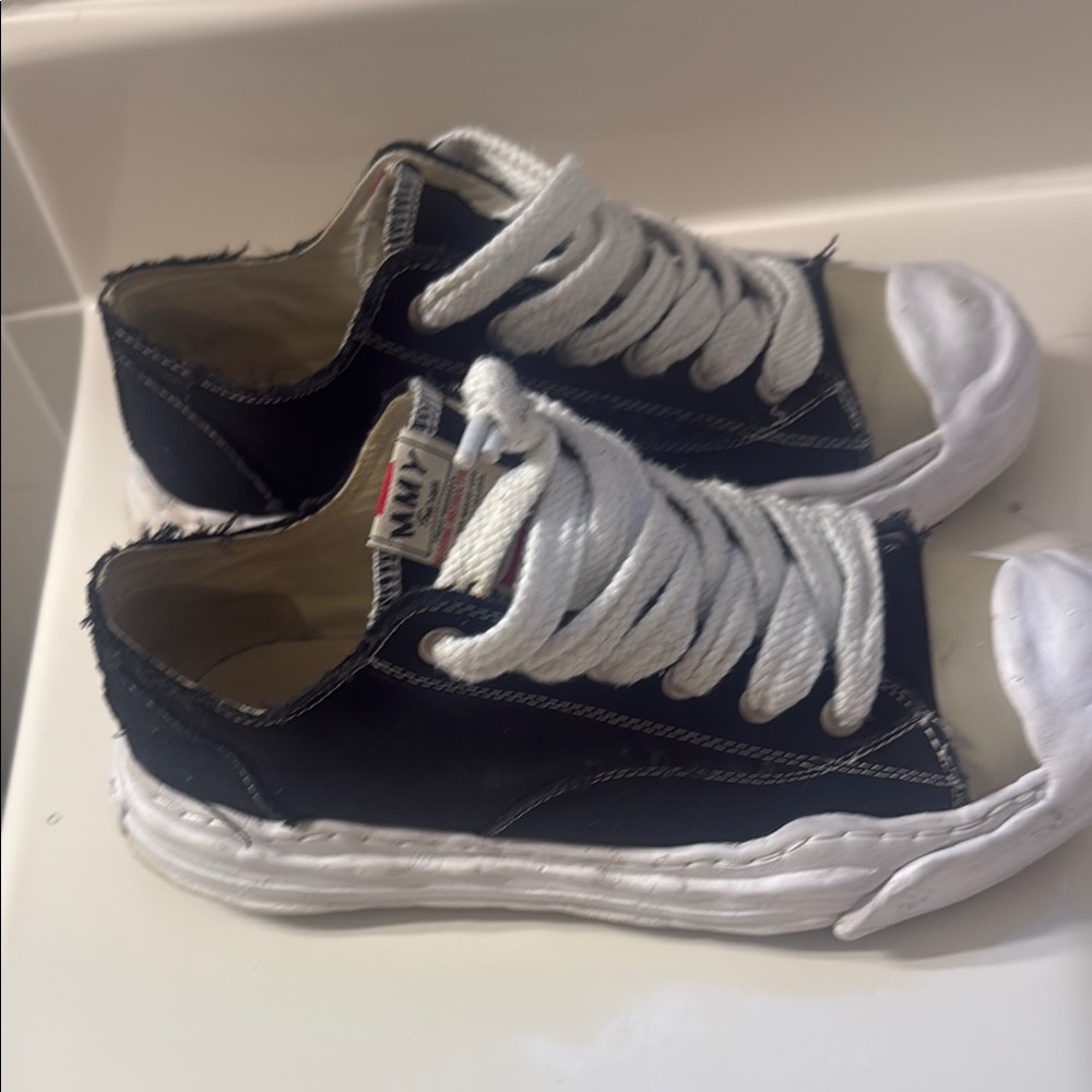 Black and White men clothe sneaker